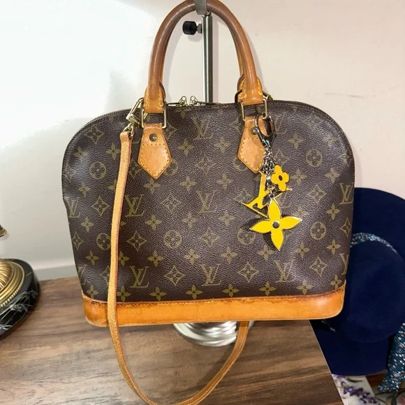 Louis Vuitton Brown and Tan Monogram with strap and keychain charm - Picture 1 of 13